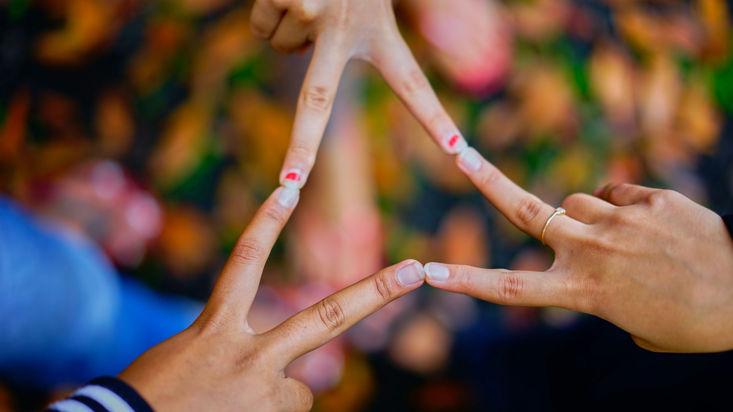 Fingertips touching - social connection - prevent and overcome burnout